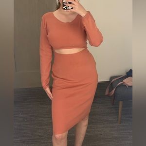 Nordstrom body con sweater dress with mid section cut out.